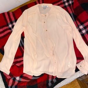 A cream pink blouse